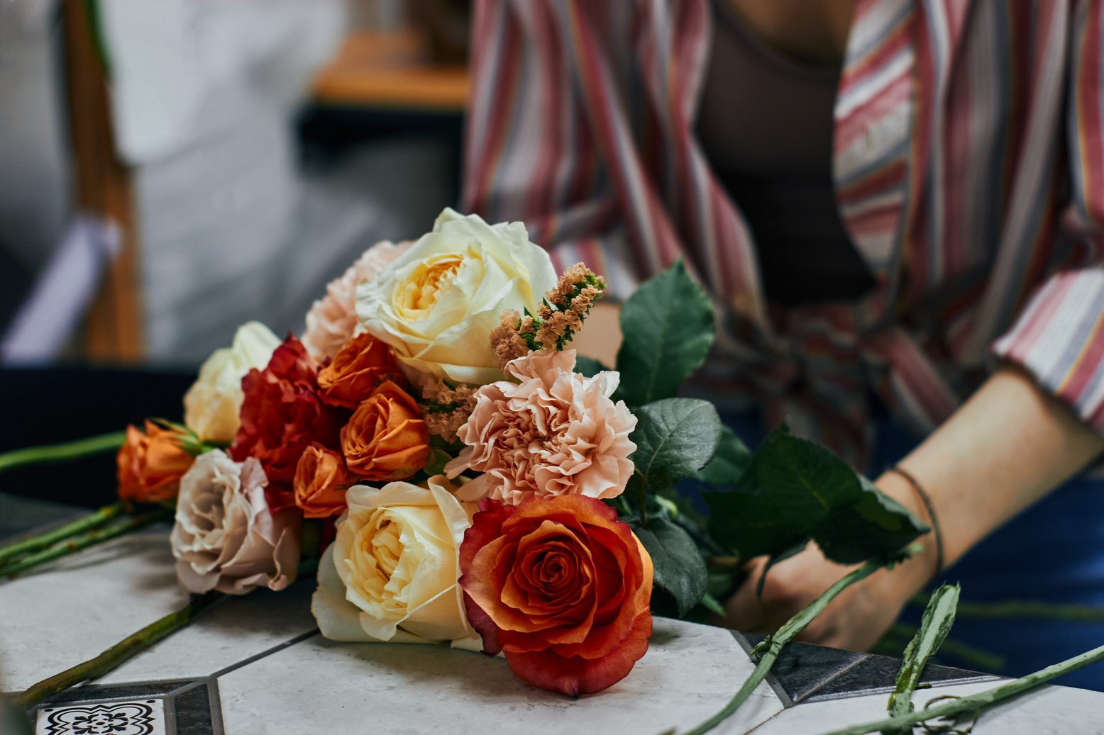 Florist Preparing Bouquet of Flowers